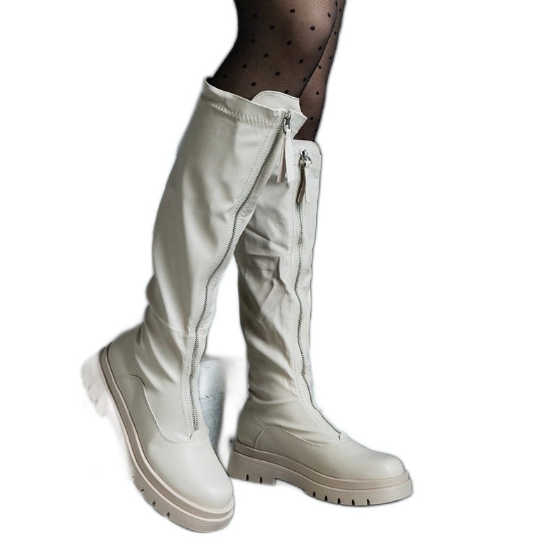 Botas bege de couro ecológico com salto plano decorado com zíper