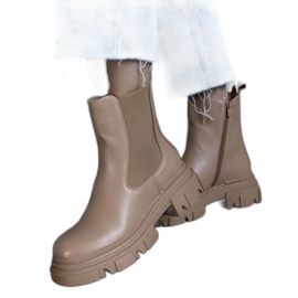 Botins bege com isolamento e zíper, couro ecológico