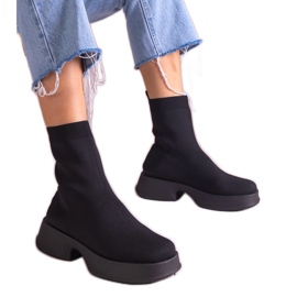 Botas pretas com uma parte superior flexível preto