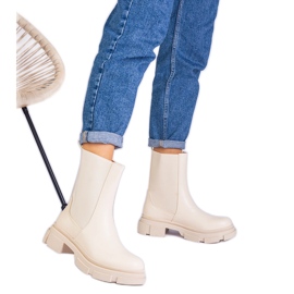 Botas bege no tornozelo com uma inserção flexível