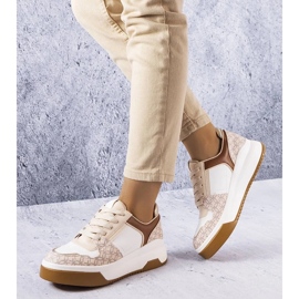 D/GMR Tênis marrom decorado com o monograma Grandbois