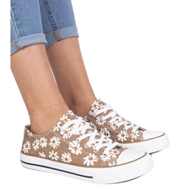 Tecidos femininos marrons com flores marrom