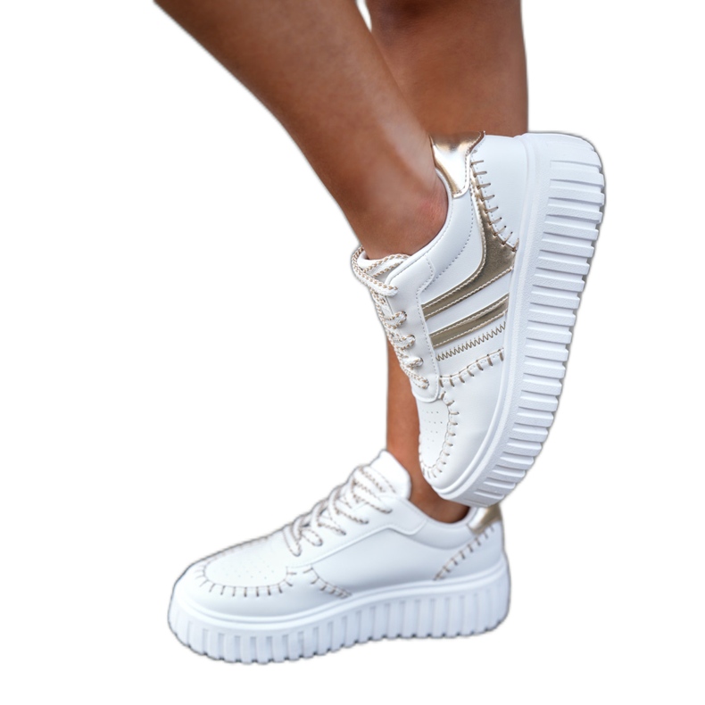 Tênis femininos na plataforma de ouro dourado