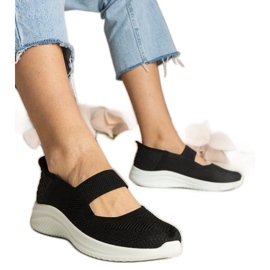 Tênis de mulheres negras em uma sola pressionada preto Tênis de mulheres negras em uma sola pressionada preto