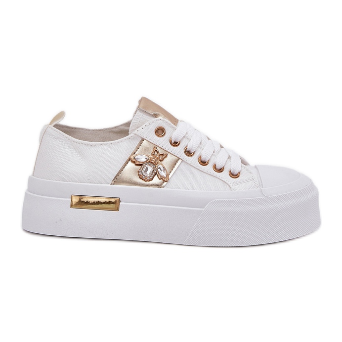 Tênis femininos na plataforma com um detalhe decorativo branco