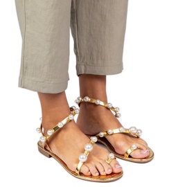 Sandálias femininas douradas decoradas com pérolas dourado
