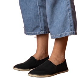 Tênis de escorregamento das mulheres negras preto