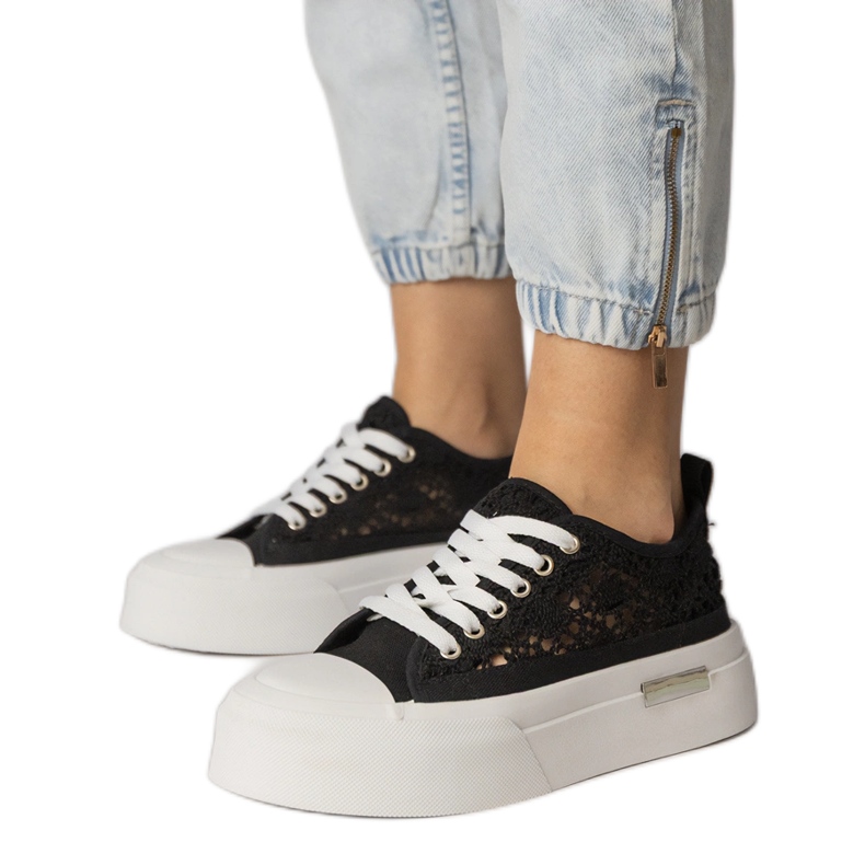 Tênis de tênis pretos