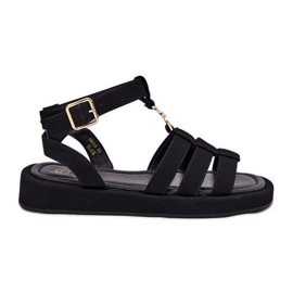 Sandálias femininas na plataforma com um detalhe dourado preto