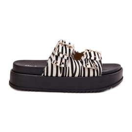 Flips femininos com fivelas douradas na plataforma Zebra branco