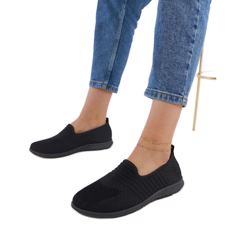 Tênis das mulheres negras preto