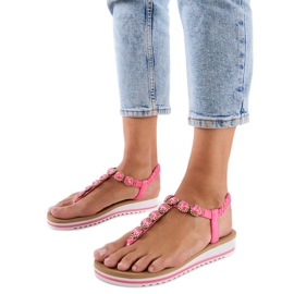 Sandálias rosa de flip -flops decoradas com zircões