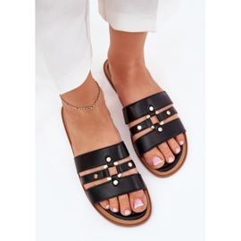 Chinelos de mulheres planas com detalhes dourados pretos