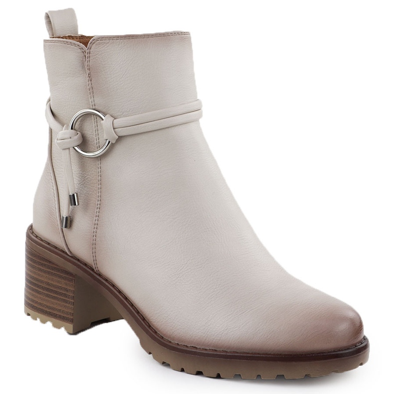 Botas femininas isoladas no bloco bege potocki sz12527