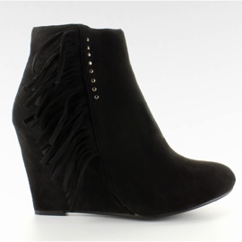 Botas de camurça em uma cunha com franjas Preto