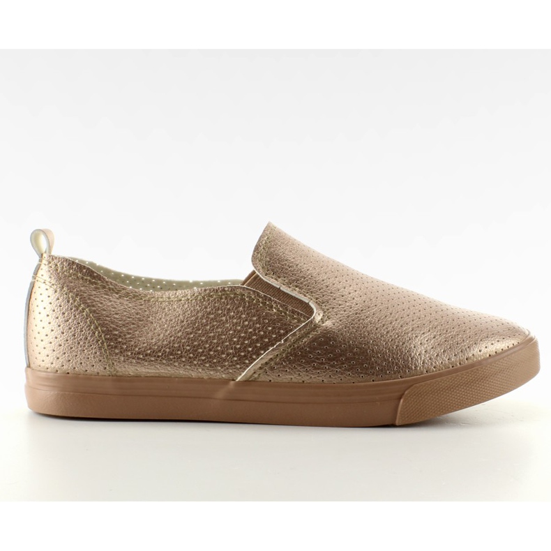 Um muito slip-on hole punch Champagne amarelo