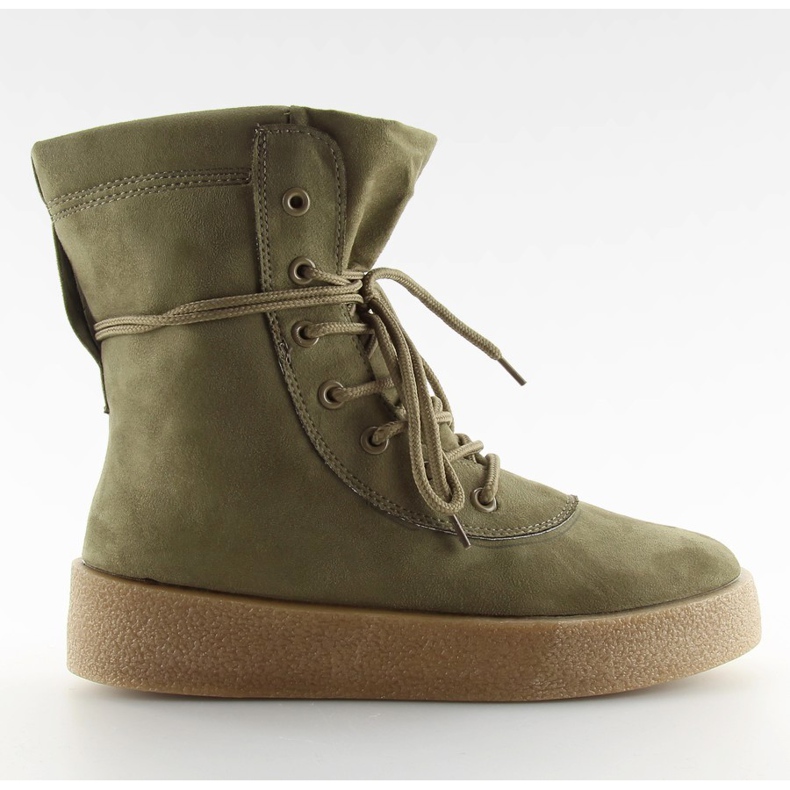 Botas verdes de sola alta