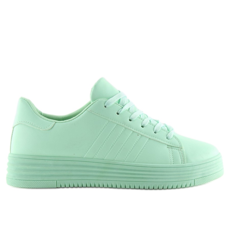 Tênis verde de sola alta