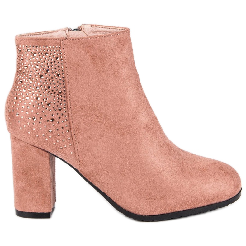 Botins de camurça no poste rosa