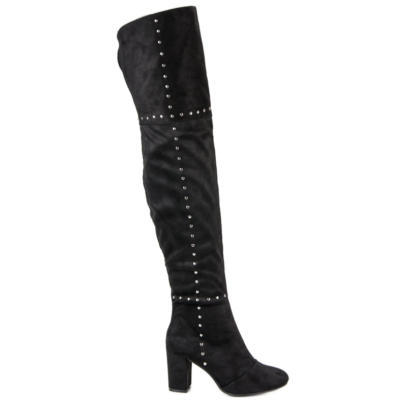 Botas de coxa pretas no poste preto Botas de coxa pretas no poste preto