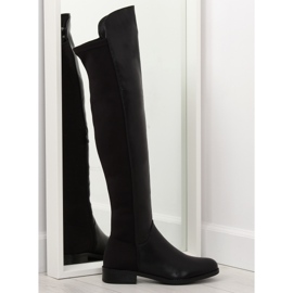 Botas pretas acima do joelho com parte superior flexível preto