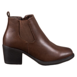 Anesia Paris Botas marrons em um poste marrom