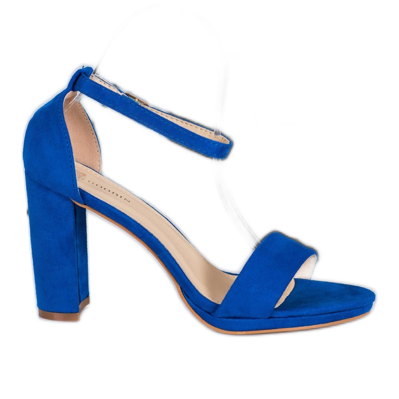 Goodin Sandálias de camurça em um bar azul