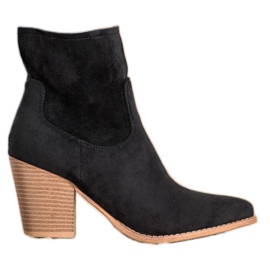 Seastar Botas deslizantes em um poste preto Seastar Botas deslizantes em um poste preto
