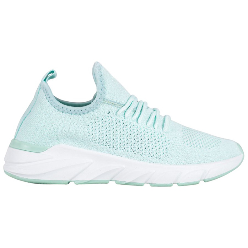 Lemax Tênis têxteis na plataforma verde