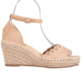 Evento Sandálias com padrão perfurado castanho