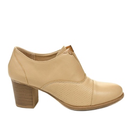 Botins bege no poste dos sapatos Silentleaf