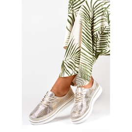 Sapatos desportivos dourados de mulher em pele genuína 1