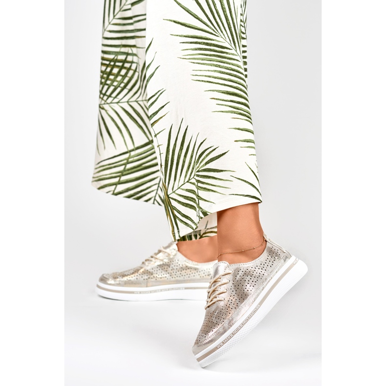 Sapatos desportivos dourados de mulher em pele genuína 2