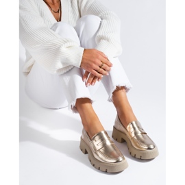 Mocassins femininos dourados com sola grossa da Shelovet 1