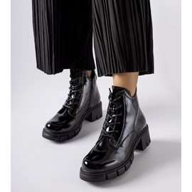 Botins pretos com isolamento envernizado da Vinceza 1