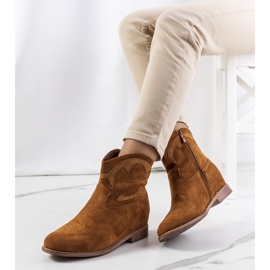 As botas de cowboy castanhas da Velha marrom 1