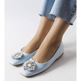Bailarinas azuis com um broche Miren azul 1