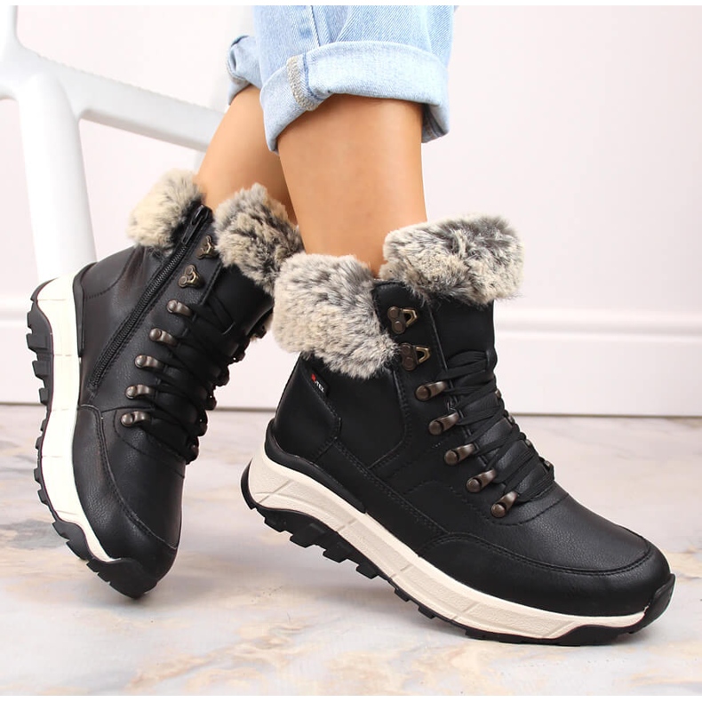 Botins femininos impermeáveis ​​de couro com isolamento de lã, pretos Rieker W0063-00 1