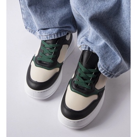 Tênis preto e verde na plataforma Baron 1