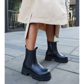 Botins pretos na plataforma Plácido 2