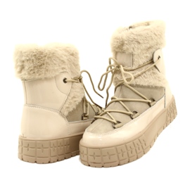 Filippo Botas de neve com pele bege envernizada 8