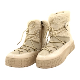 Filippo Botas de neve com pele bege envernizada 7