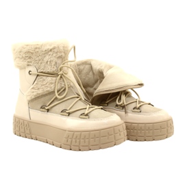 Filippo Botas de neve com pele bege envernizada 10