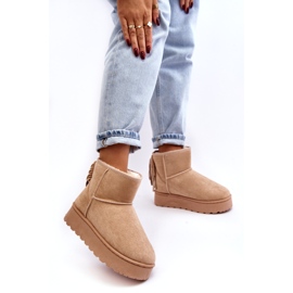 Botas de neve femininas em uma plataforma enorme com bege com franjas 3