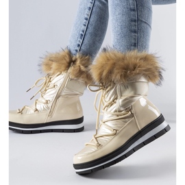 Botas de neve bege envernizadas com pele de arco 1