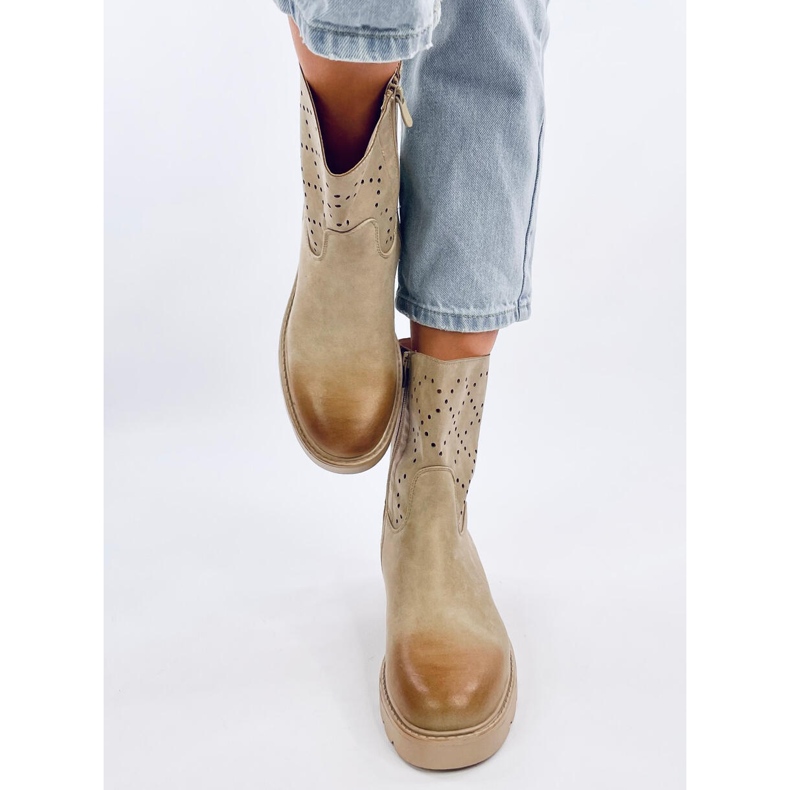 Botas com aberturas verdes Issey 1