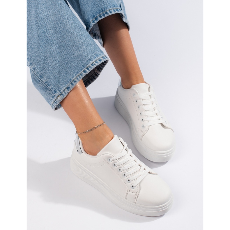 Calçados esportivos femininos brancos 1