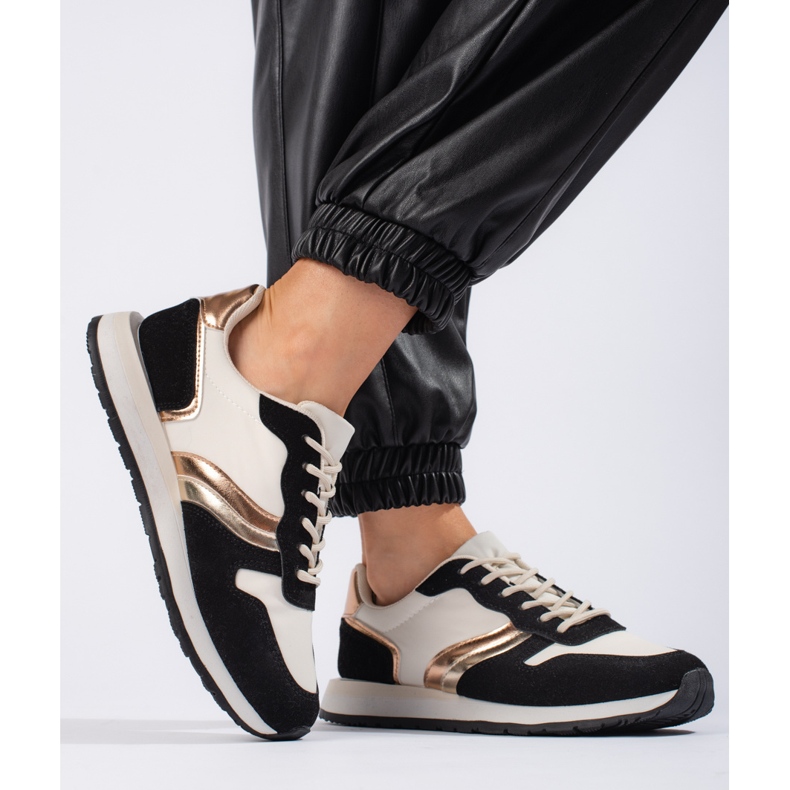 Calçados esportivos femininos pretos 1