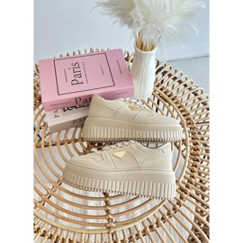 Tênis feminino bege Chrisstin feito de couro ecológico em uma plataforma enorme 1