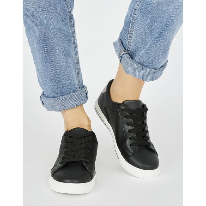 Calçados esportivos pretos femininos clássicos 1